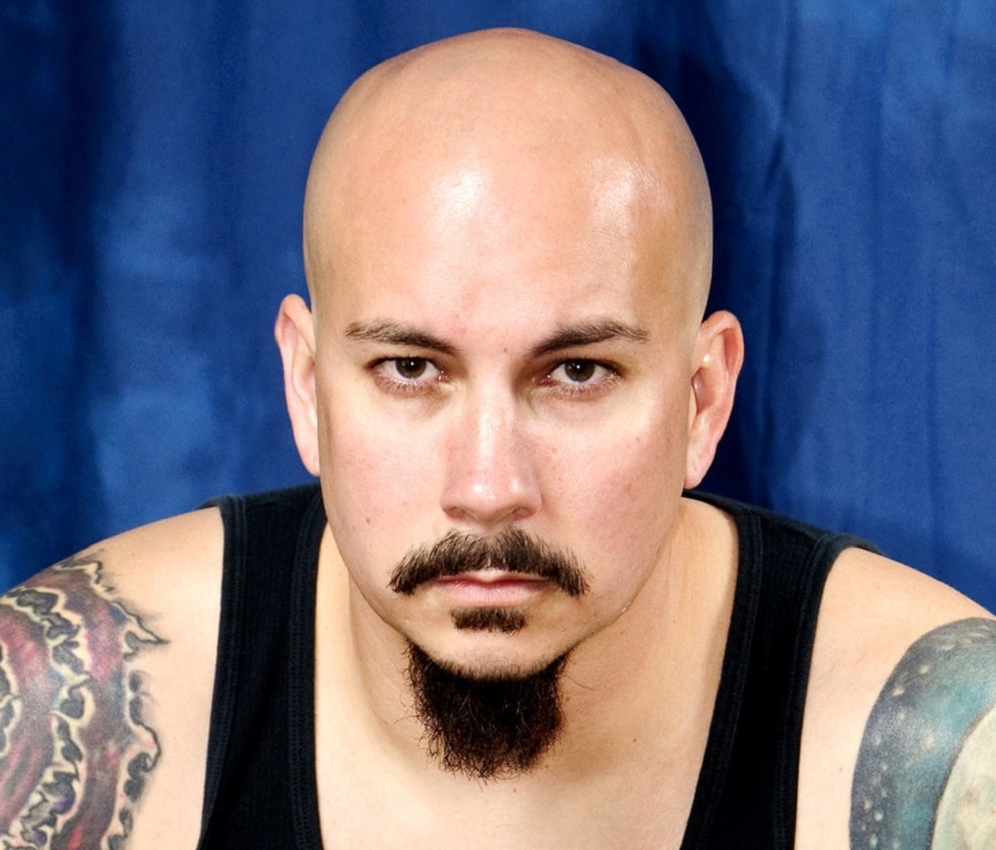 bald guy with goatee and mustache