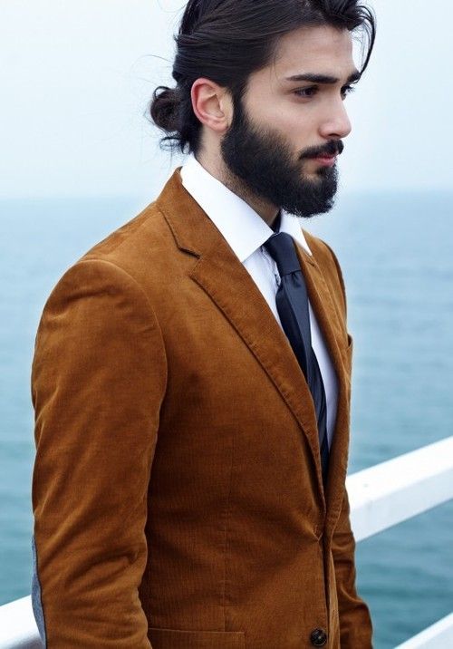 scruffy beard with top knot