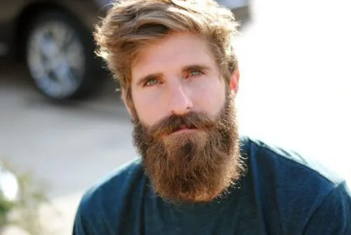 Blond with curly beard style for men 