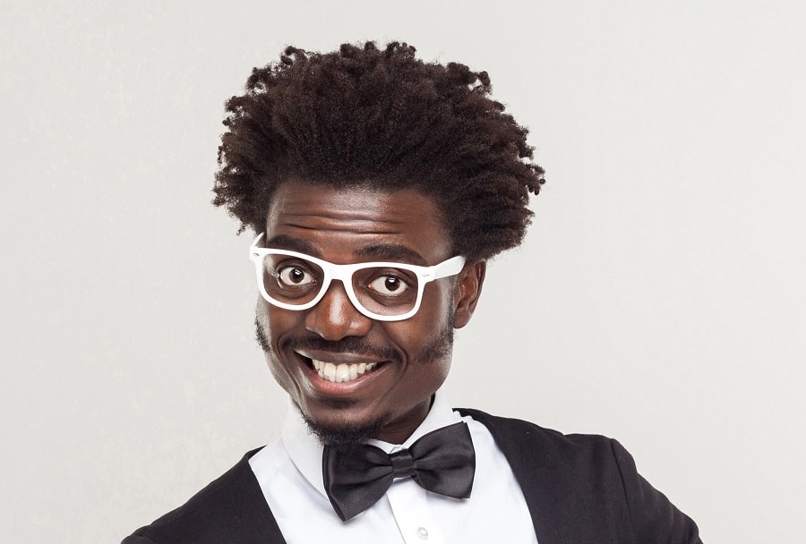black guy with mustache and curly hair