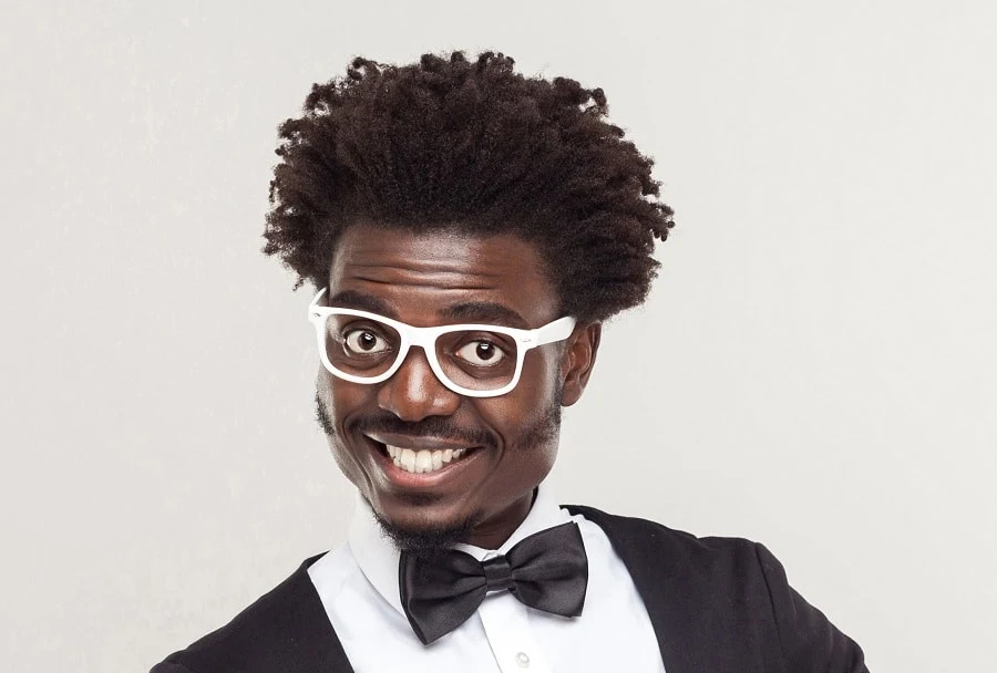 black guy with mustache and curly hair