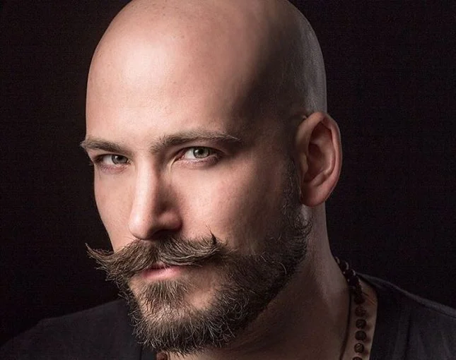 bald men with mustache