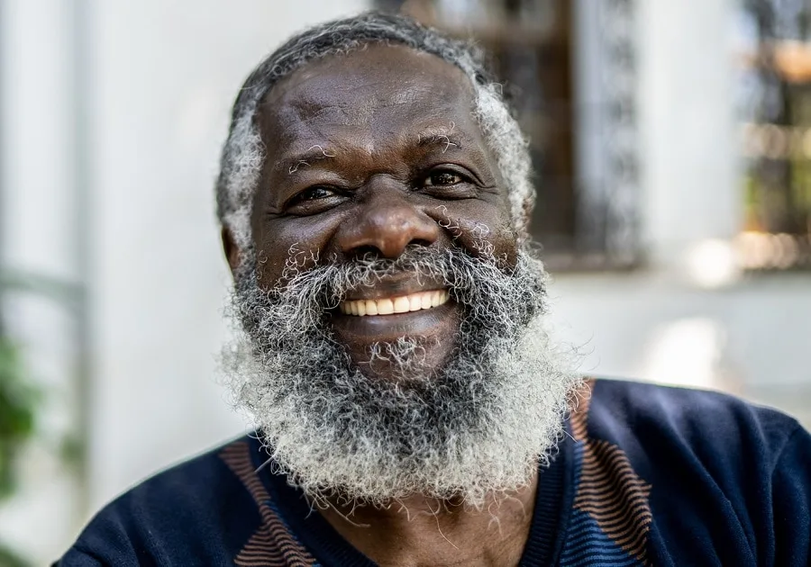 black man with curly beard