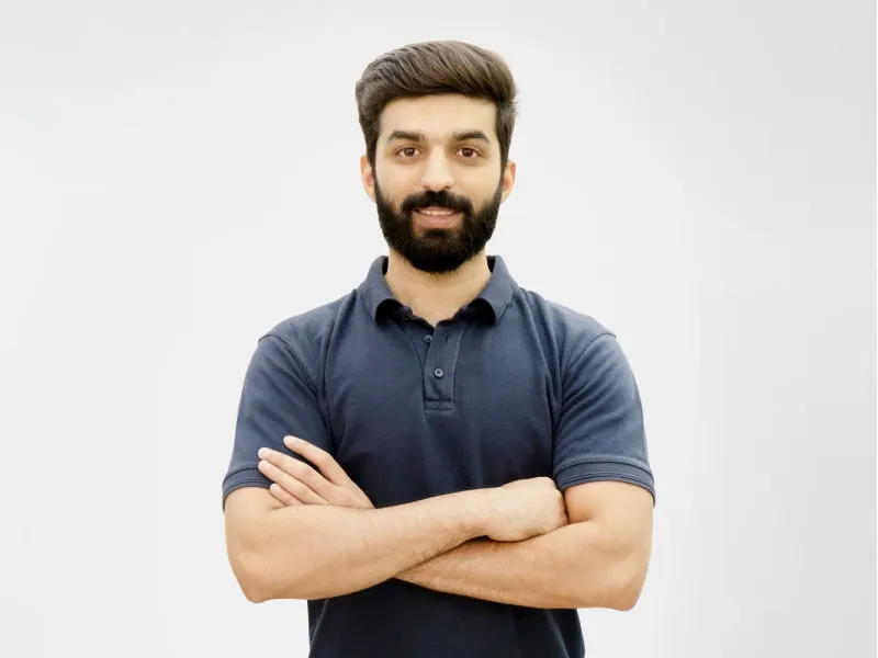 asian man with rounded beard