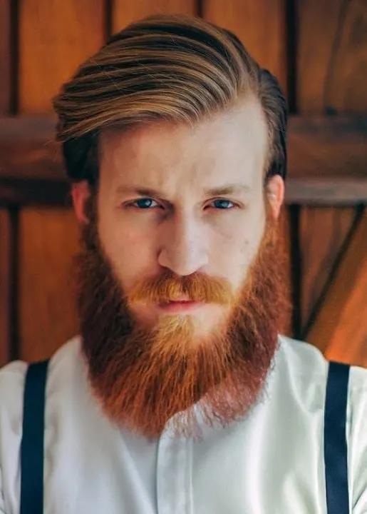 red bushy beard with comb over brown hair