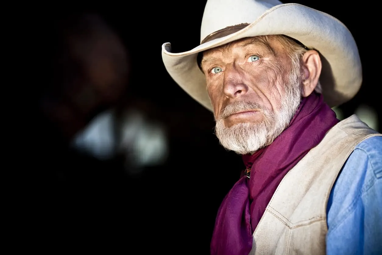 Grey rounded beard for senior cowboy