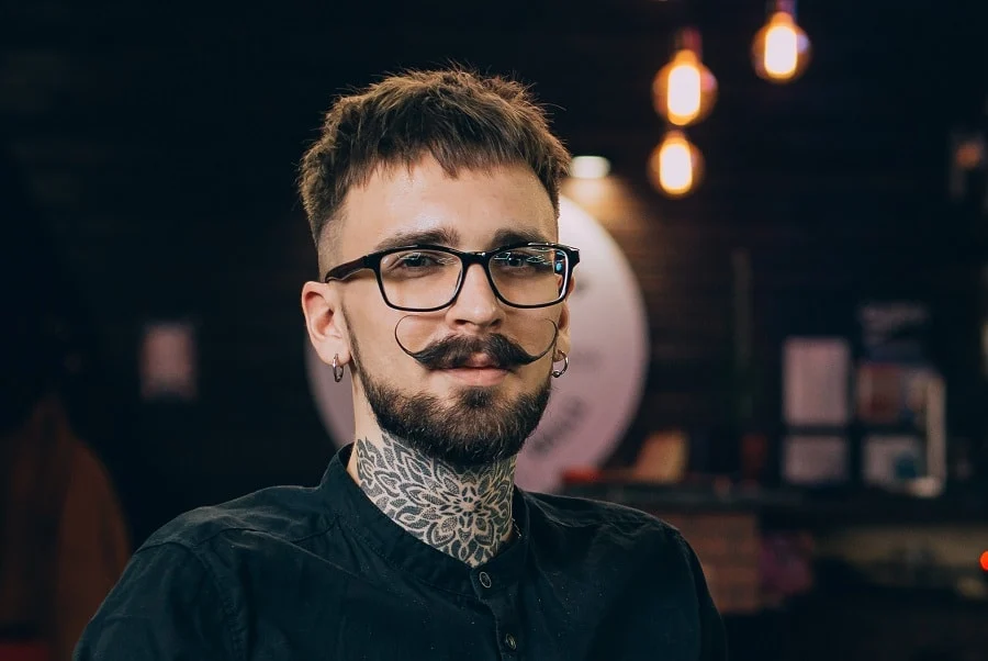 Italian young man with thin handlebar mustache