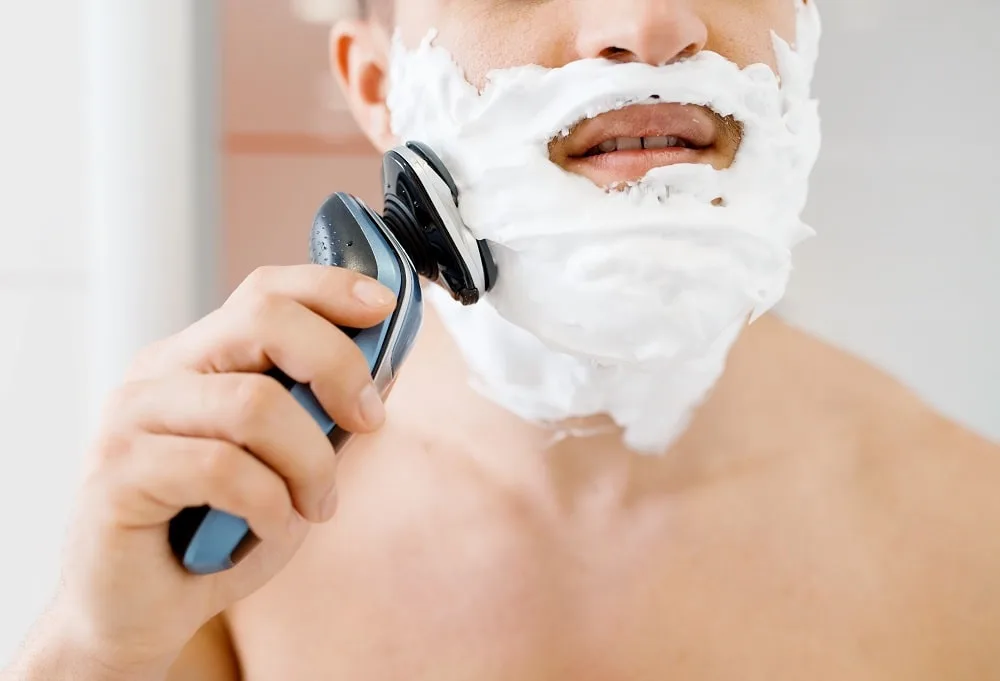 shaving with electric razor and shaving cream