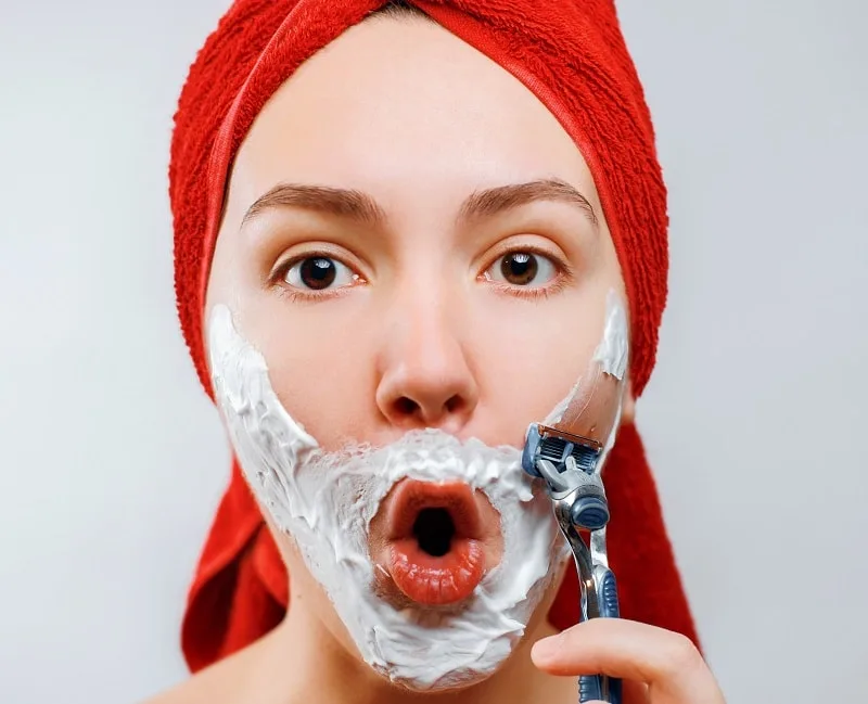 women with beard shave off her beard