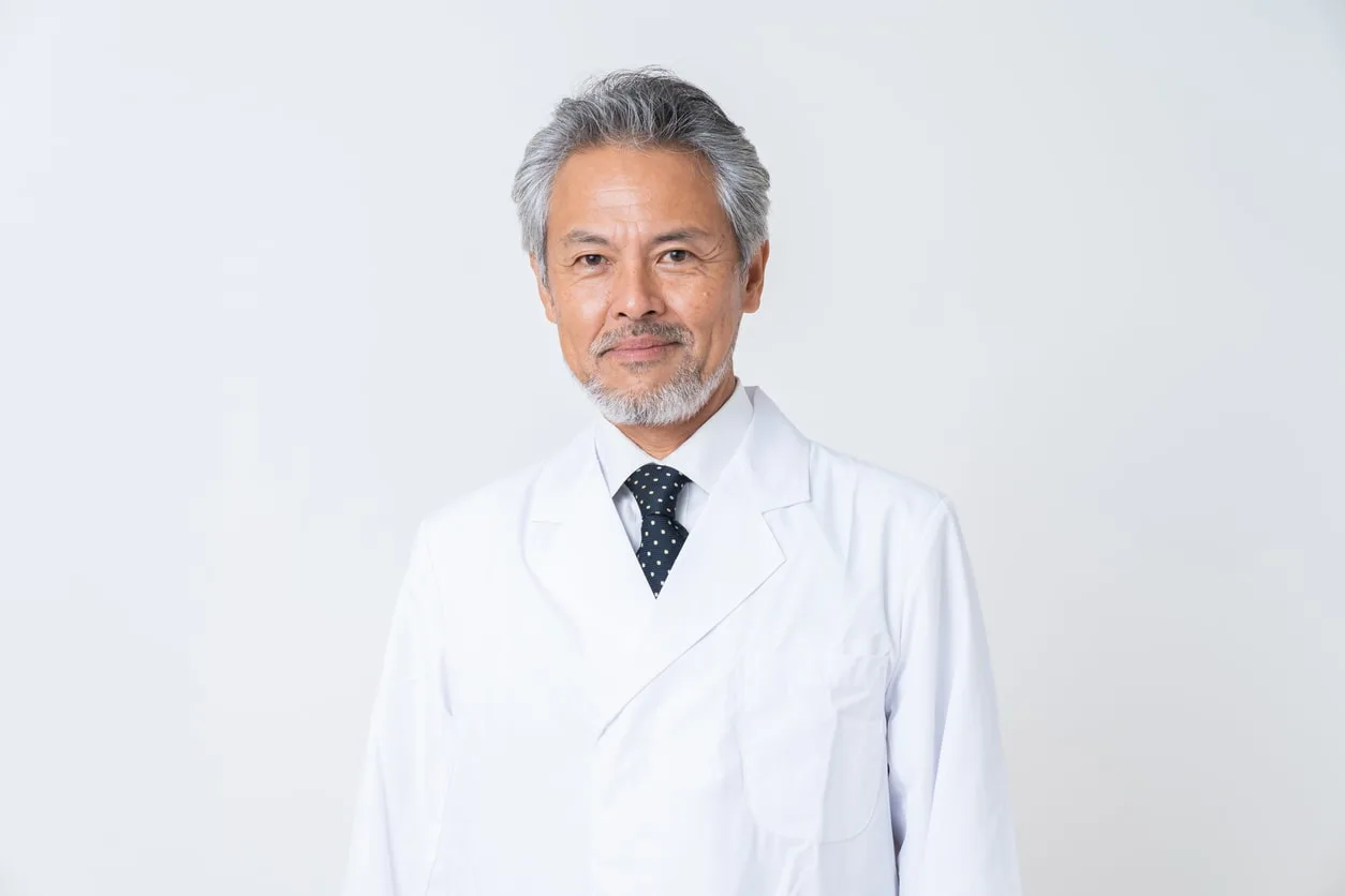 japanese man with grey beard and salt and pepper mustache