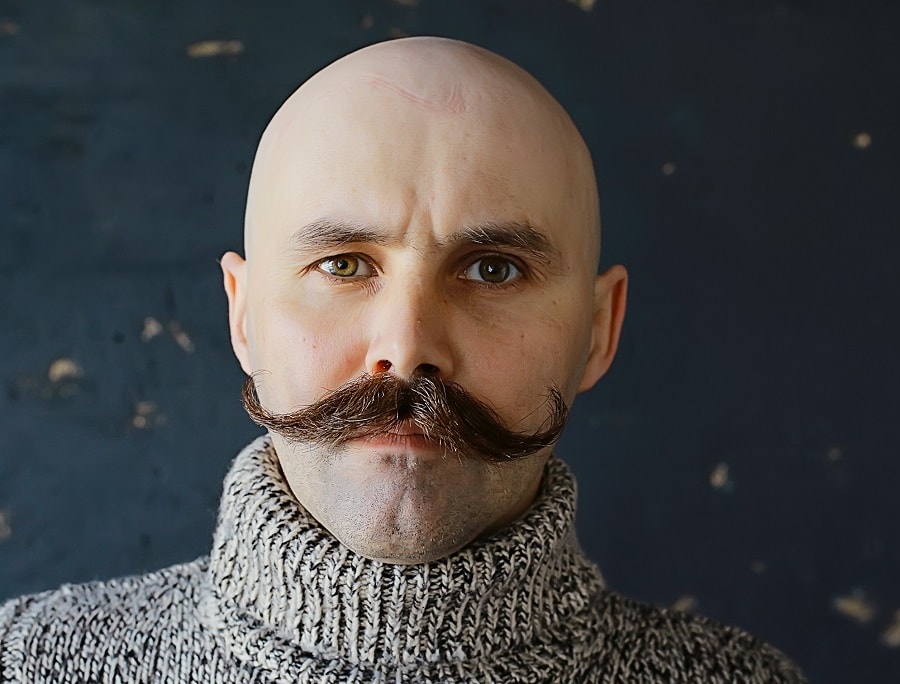 bald guy with French mustache