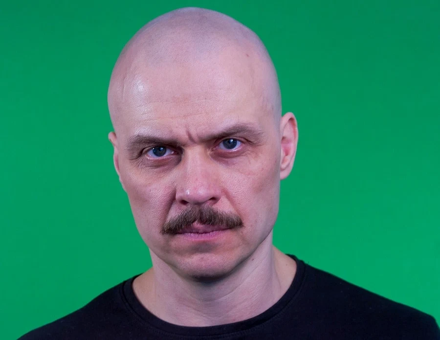 bald guy with thick mustache