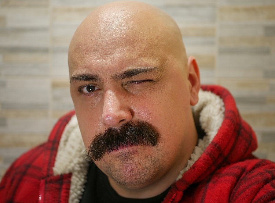 bald guy with walrus mustache
