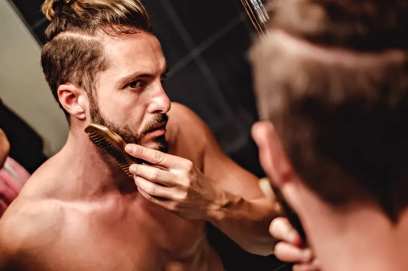 combing beard to prevent curls