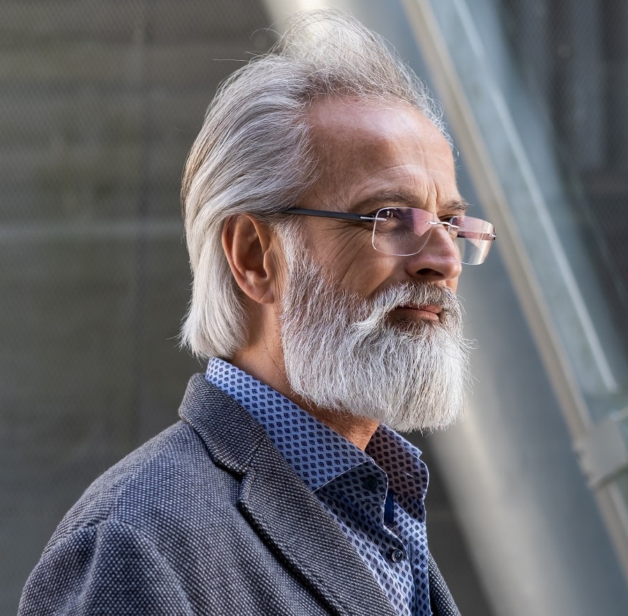 Premium Photo  Ai generated illustration of thoughtful mature male with  creative long white beard and hair in warm clothes looking away pensively  against black background