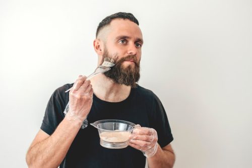 How to Dye Your Beard White, According to Pros