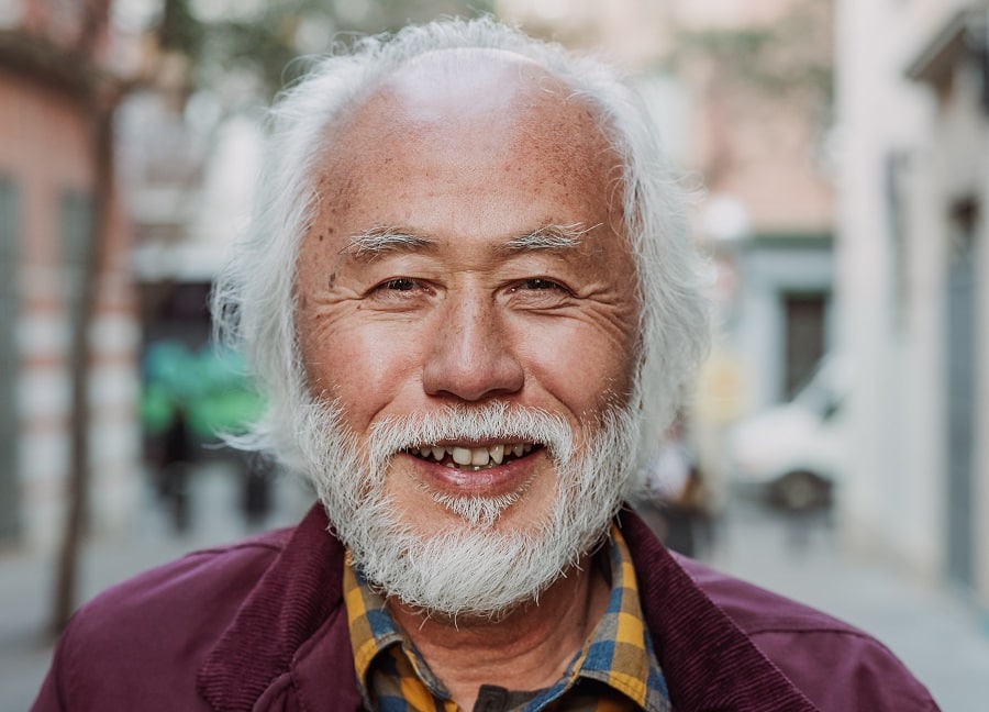 Asian balding man with grey beard