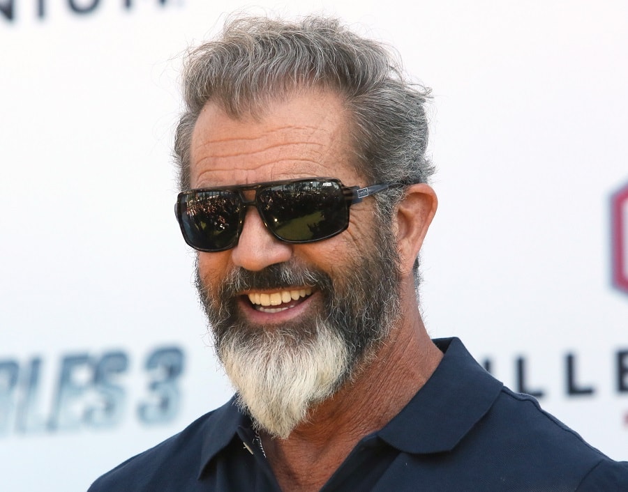 celebrity inspired older men's wavy hair with ducktail beard