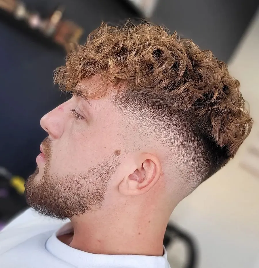 curly fade with short beard