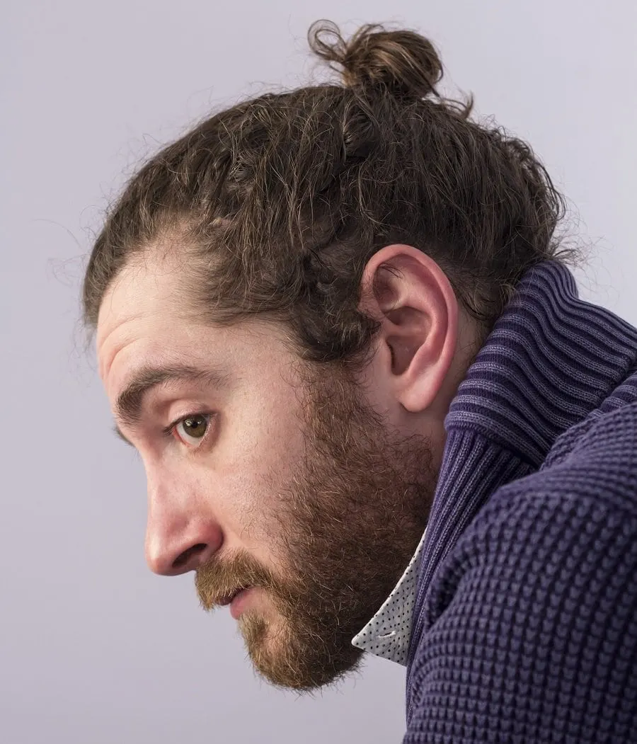 curly man bun with beard