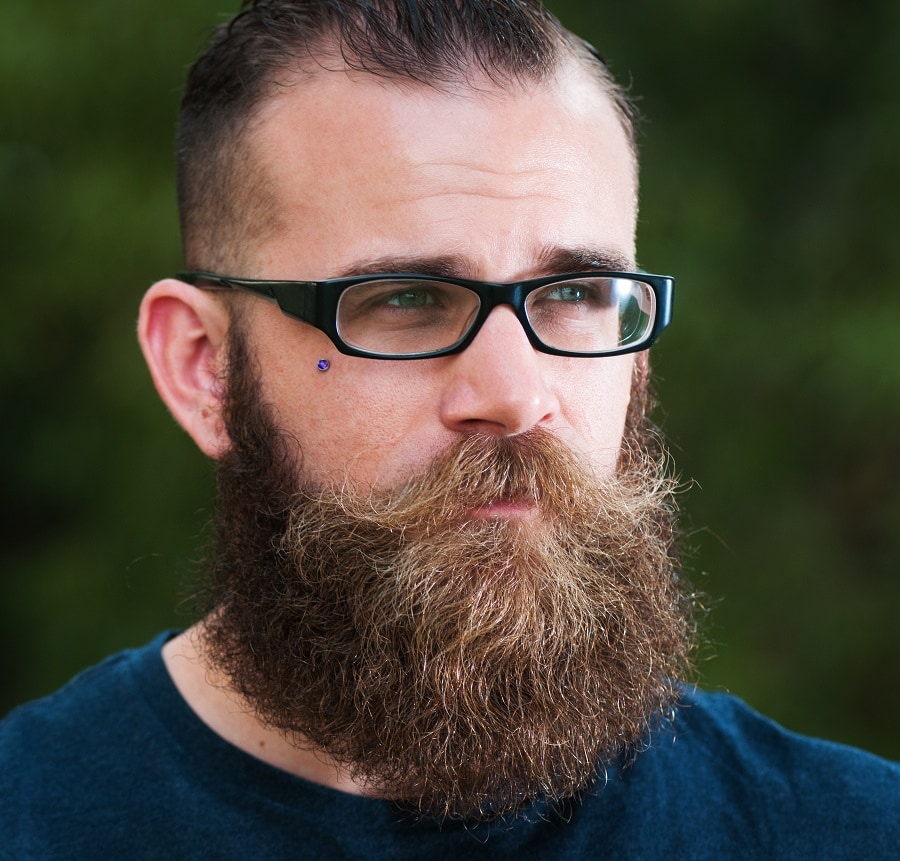 man with bushy beard and glasses