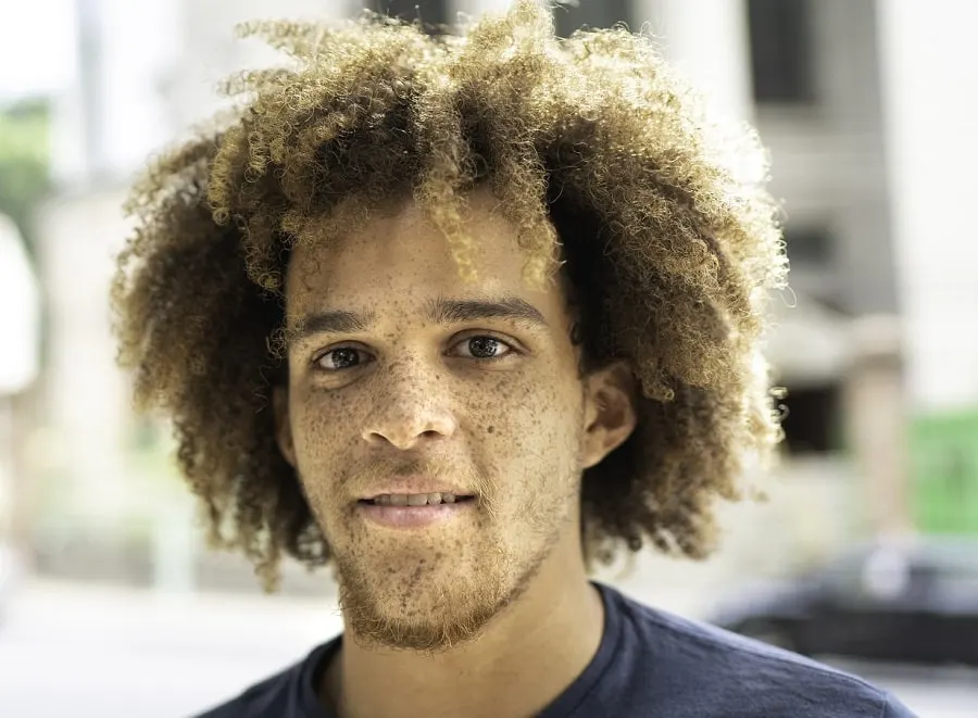 medium curly hair with chinstrap beard