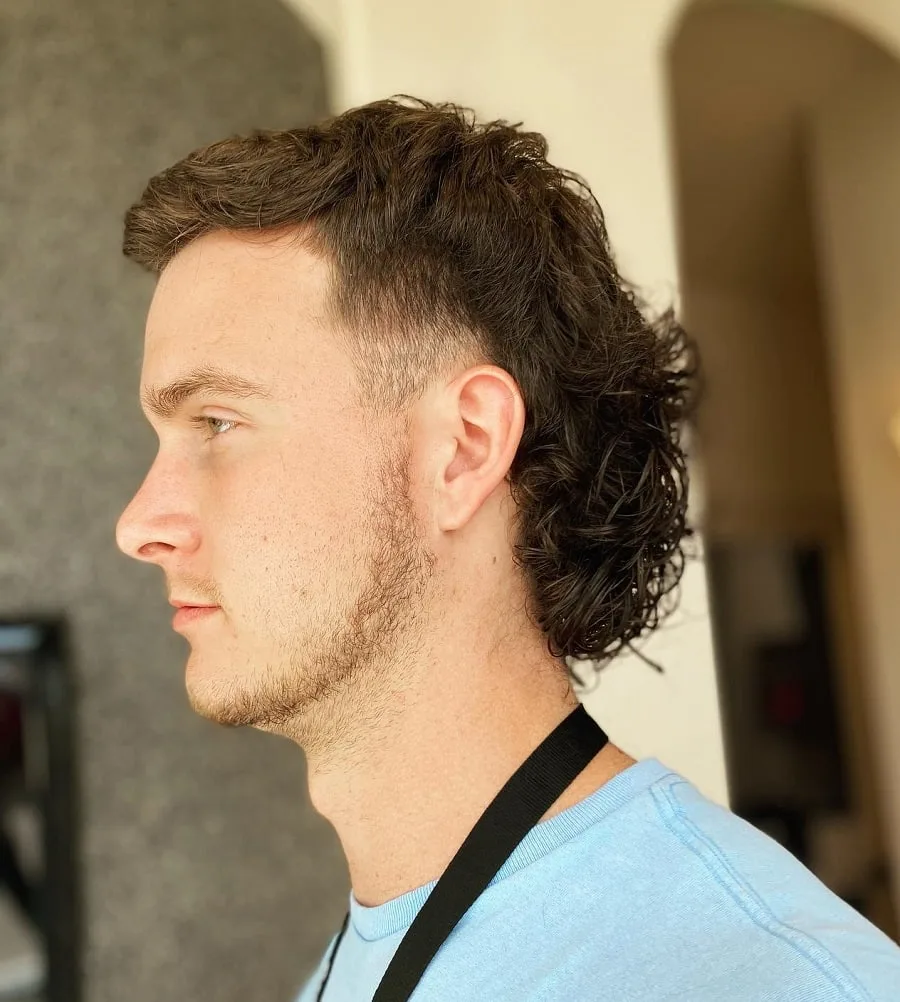 mullet hair with a jawline beard