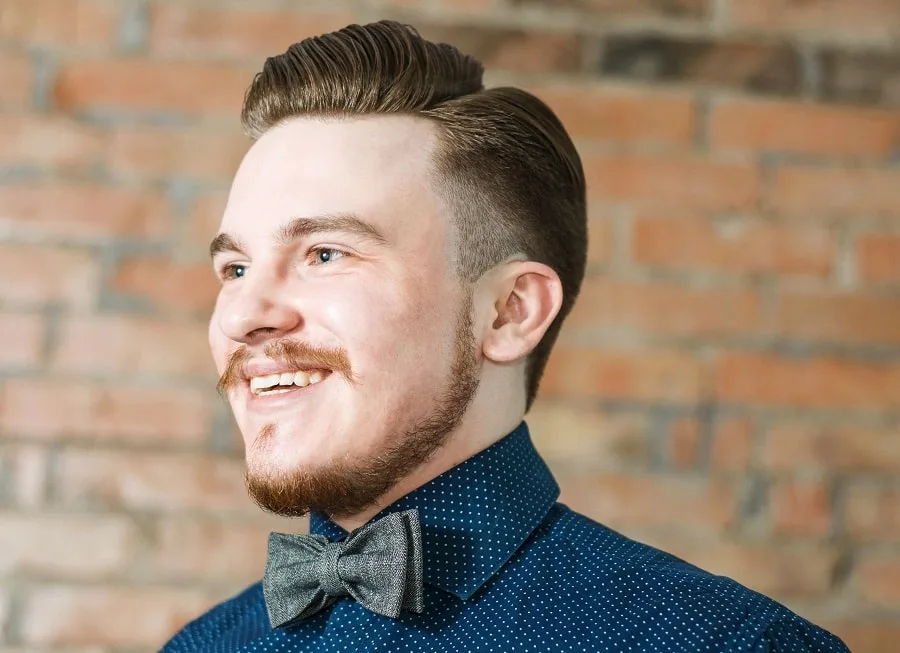 pompadour hairstyle with chinstrap beard