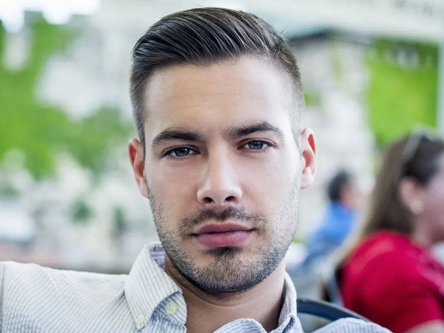 pompadour hairstyle with stubble beard