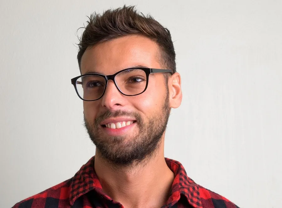 blowout haircut with beard and glasses