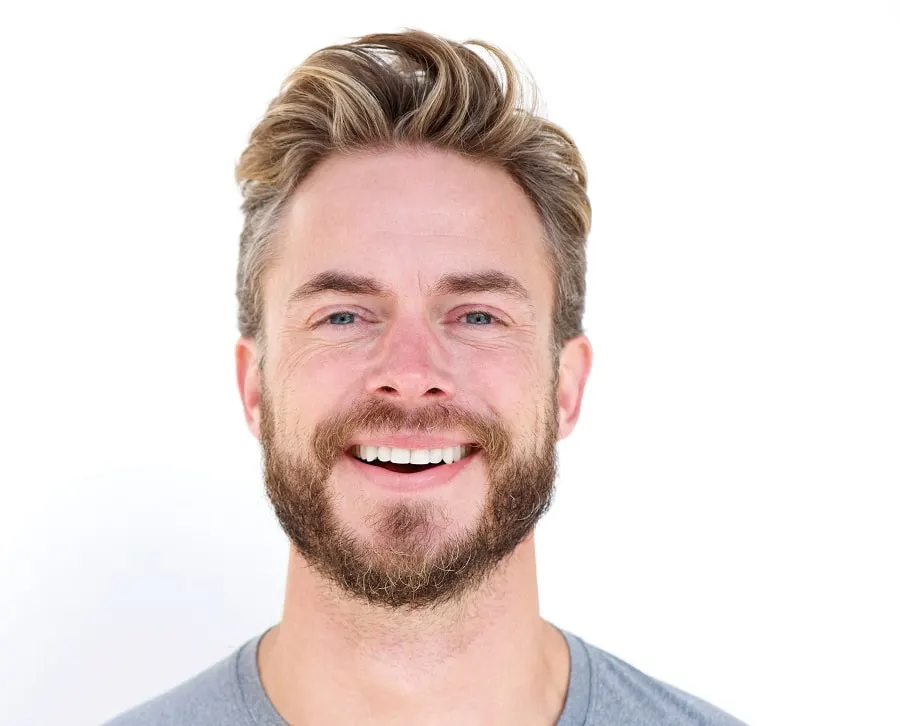 blowout haircut with highlights and beard