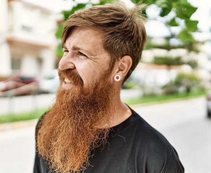 blowout haircut with very long beard