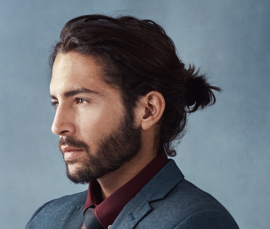 business ponytail hairstyle with short beard