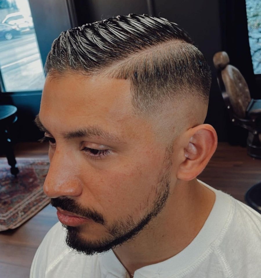 comb over skin fade with beard