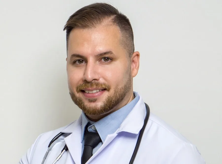 crew cut with side part and beard