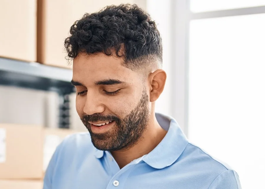 curly burst fade with short beard