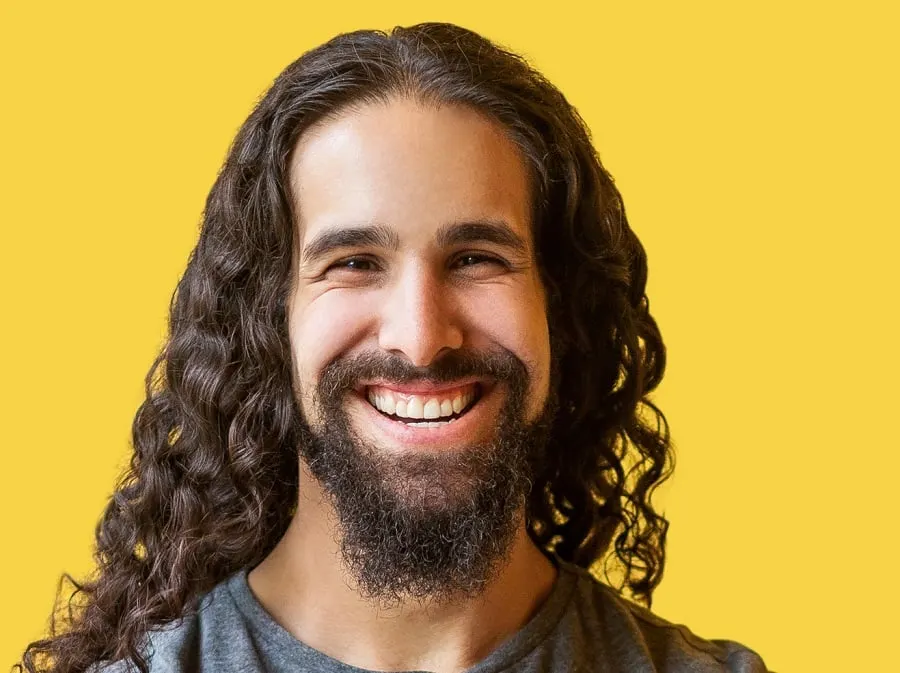 long curly goatee with short beard