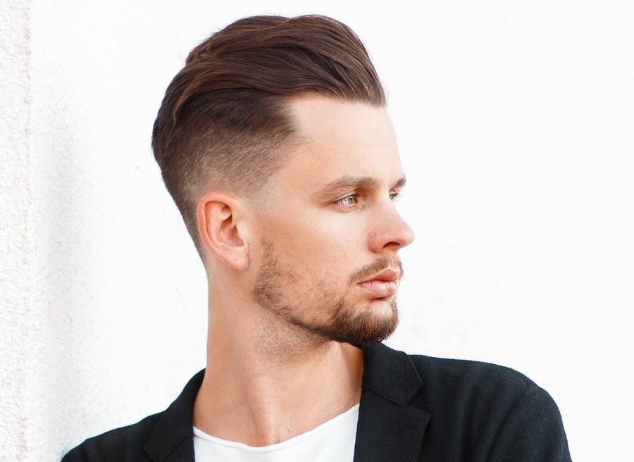 low fade haircut with patchy beard