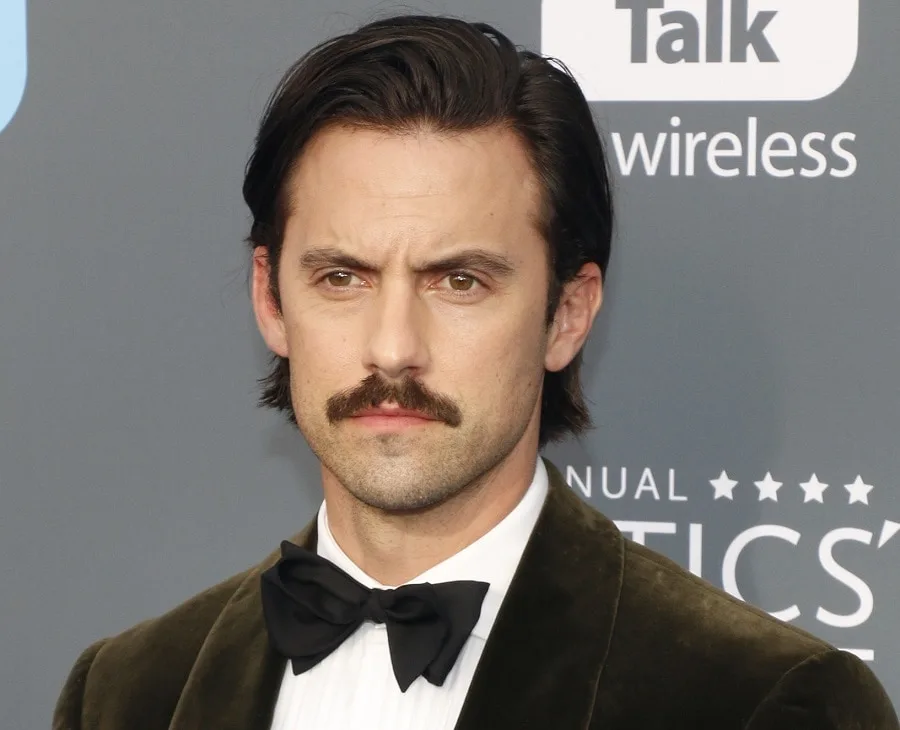 male celebrity with 70s mustache