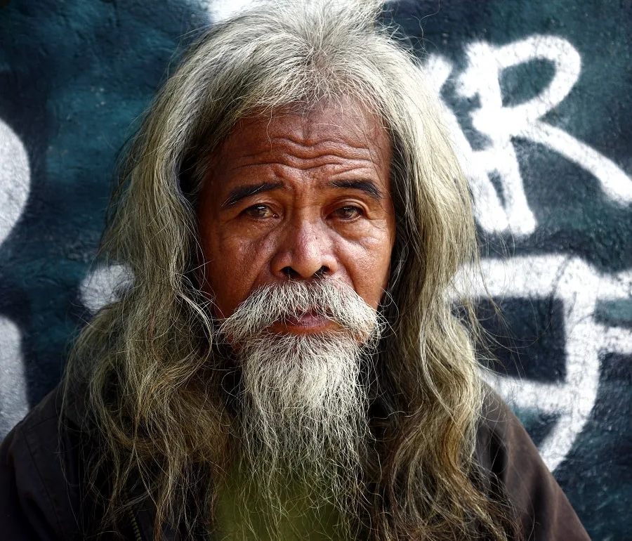 older Filipino man with long beard