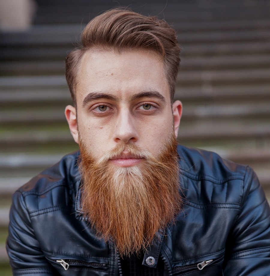 short side part hair with long two tone beard