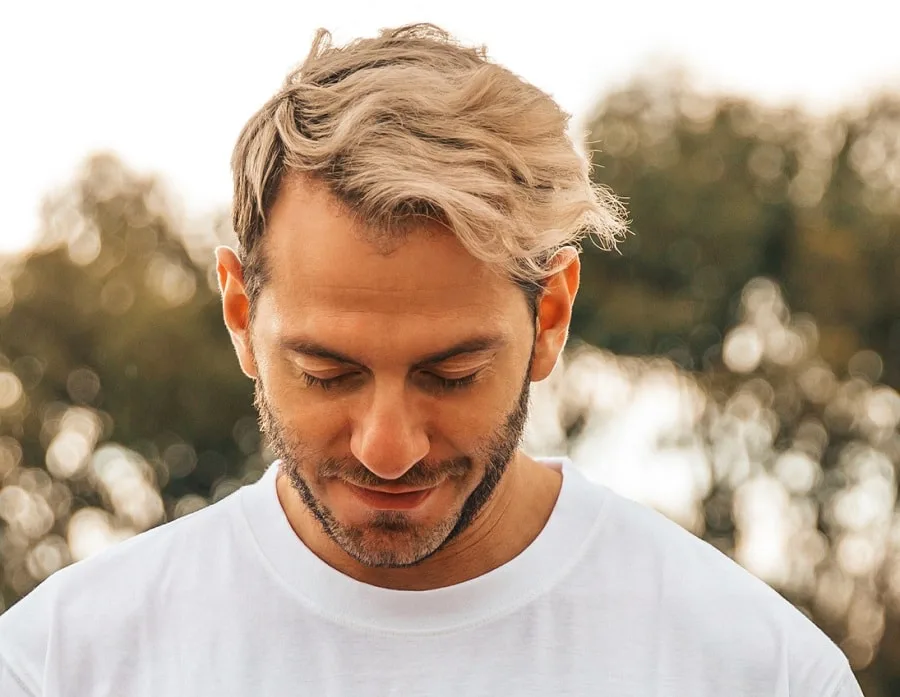 wavy blowout hairstyle with beard