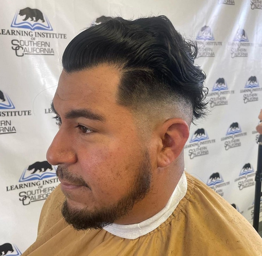 wavy comb over fade with chin strap beard
