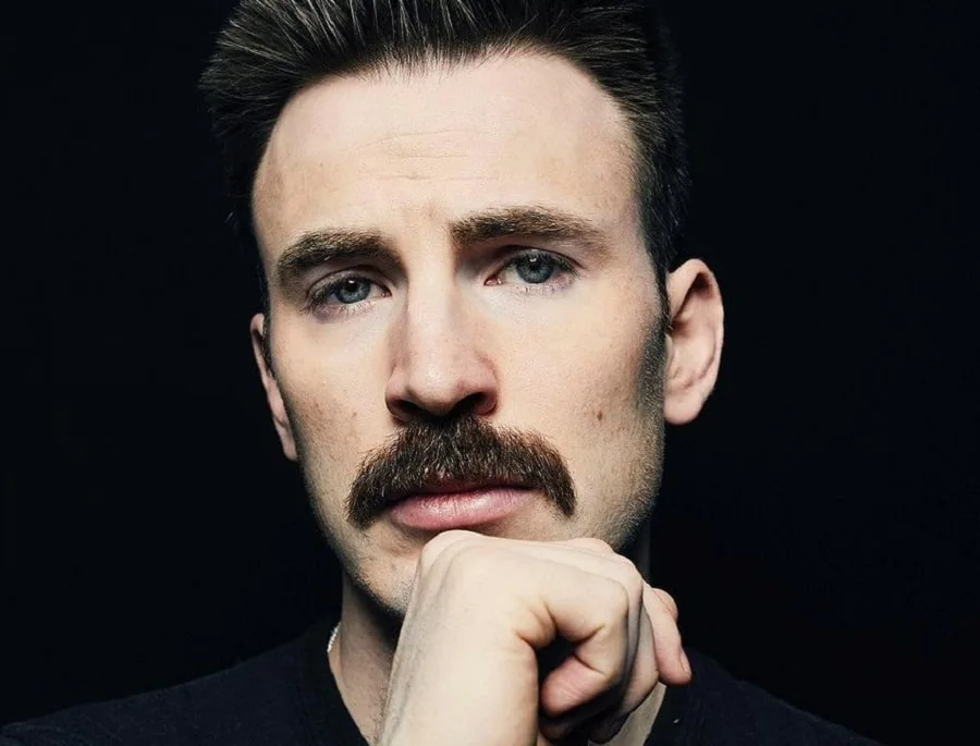 young actor Chris Evans with walrus mustache