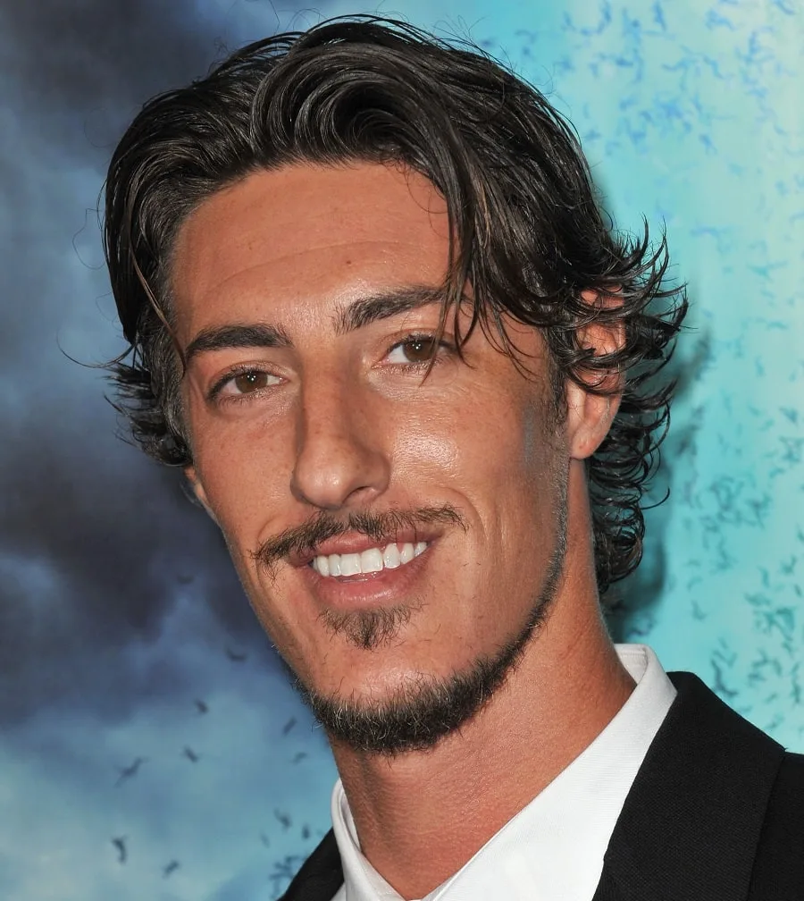 young actor Eric Balfour with thin mustache