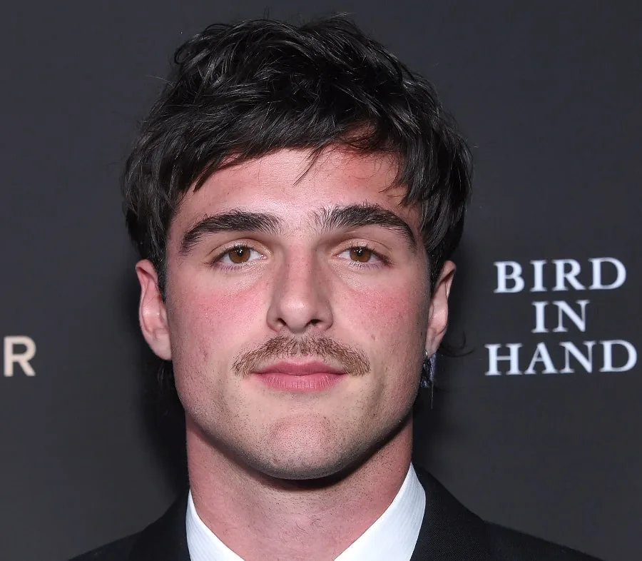 young actor Jacob Elordi with thin mustache
