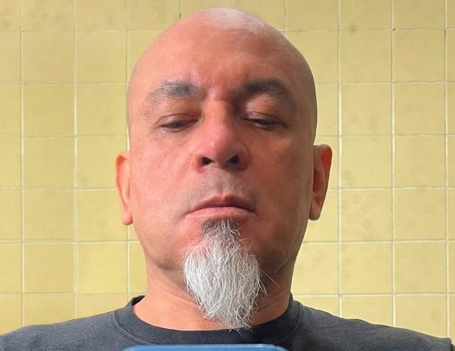 bald guy with chin puff goatee