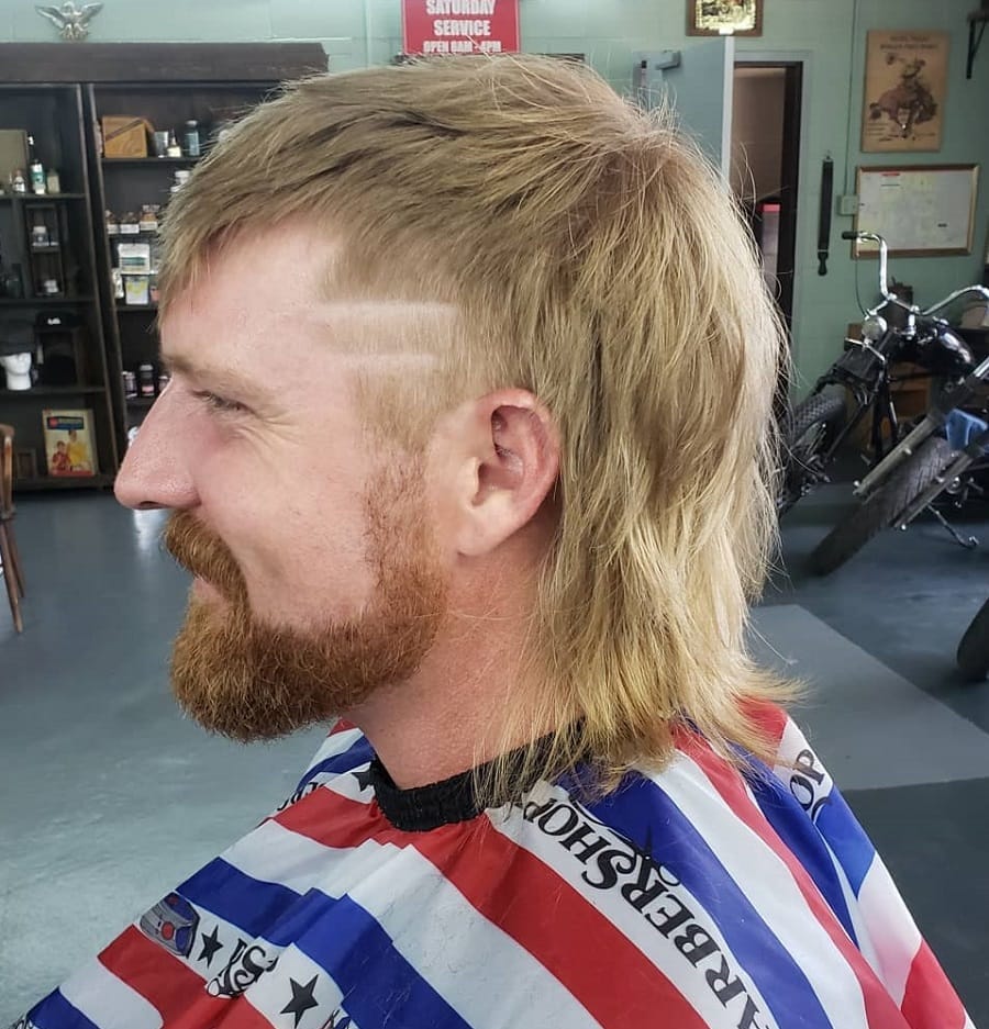blonde shaggy mullet with full red beard