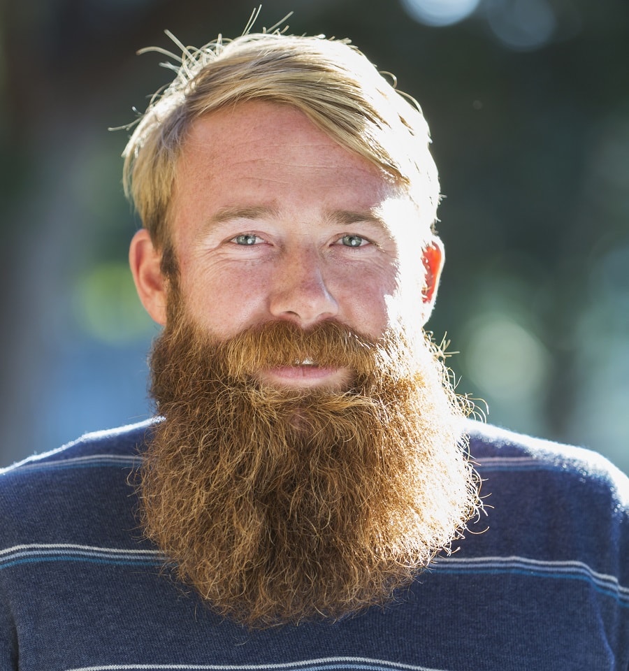 blonde side swept hair with red bandholz beard