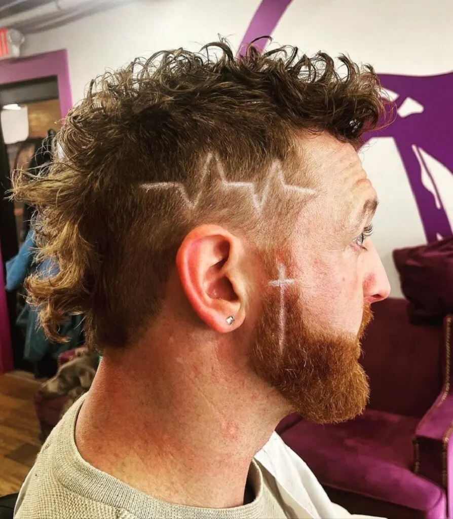 curly faux hawk with designer full beard